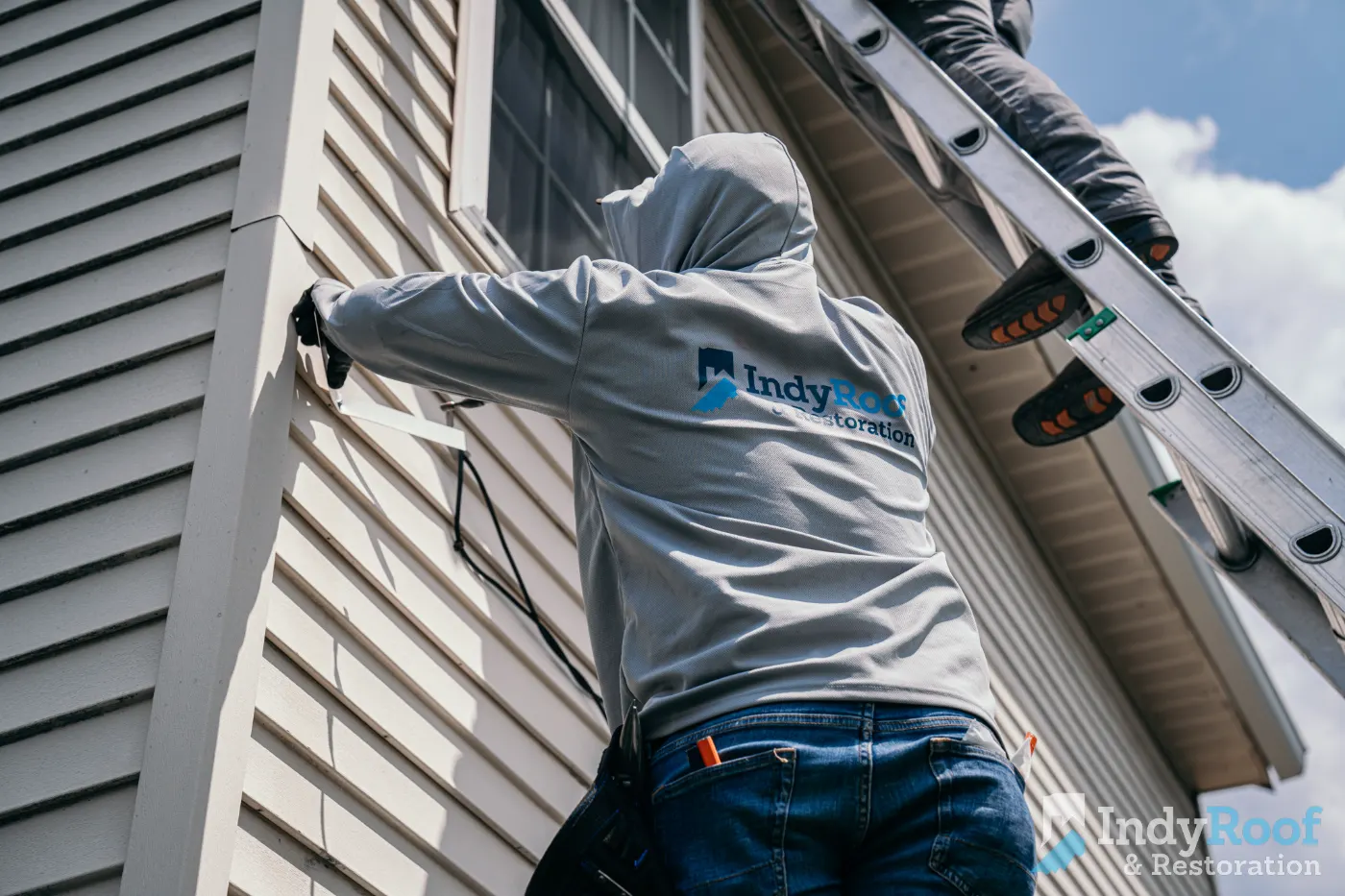 Siding installation documented in Timberbrook